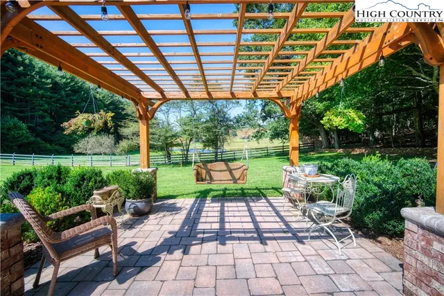 a porch with outdoor seating