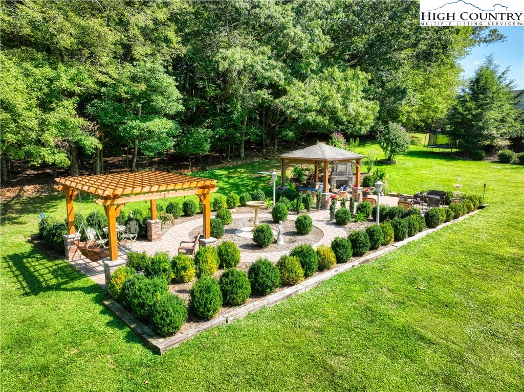 330 Crain Branch Lane Jefferson, NC 28640 - Photo 3 of 45 a view of yard with swimming pool and patio