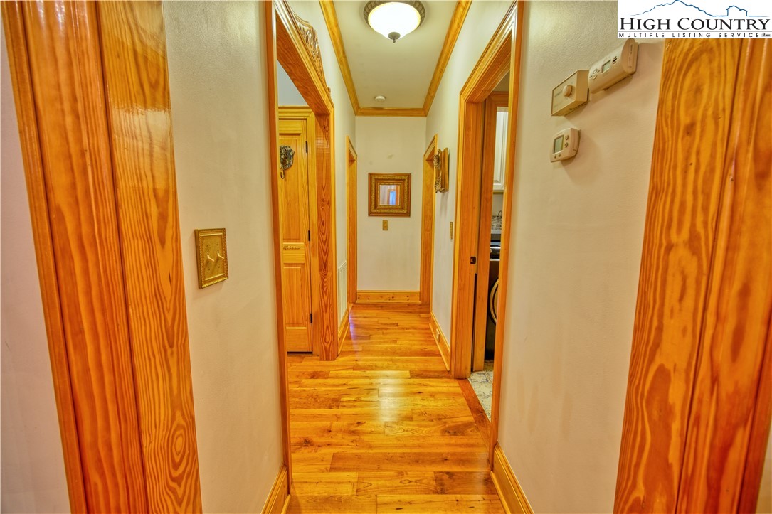 330 Crain Branch Lane Jefferson, NC 28640 - Photo 35 of 45 a view of a hallway with wooden floor and staircase