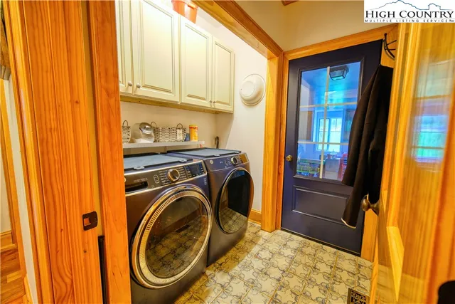 a view of a storage & utility room with a sink