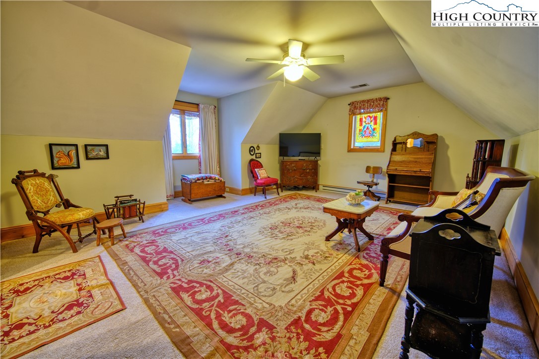 330 Crain Branch Lane Jefferson, NC 28640 - Photo 40 of 45 a bedroom with furniture and a mirror