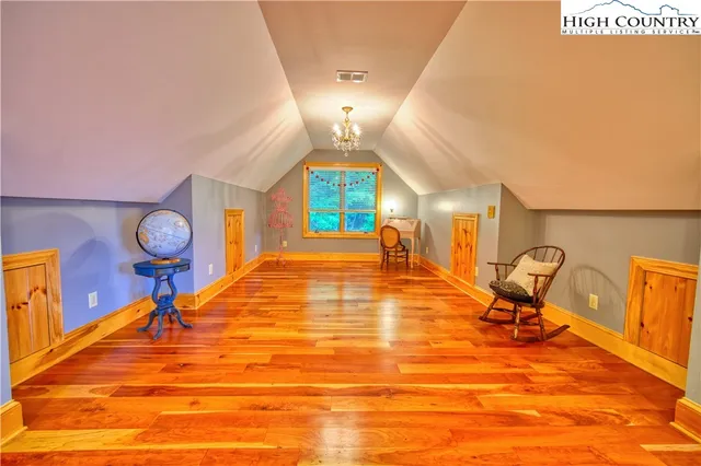 a room with gym equipment and window