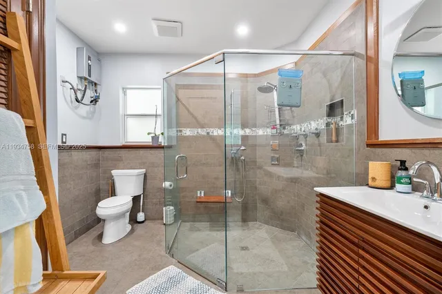 a view of a house with a backyard porch and sitting area