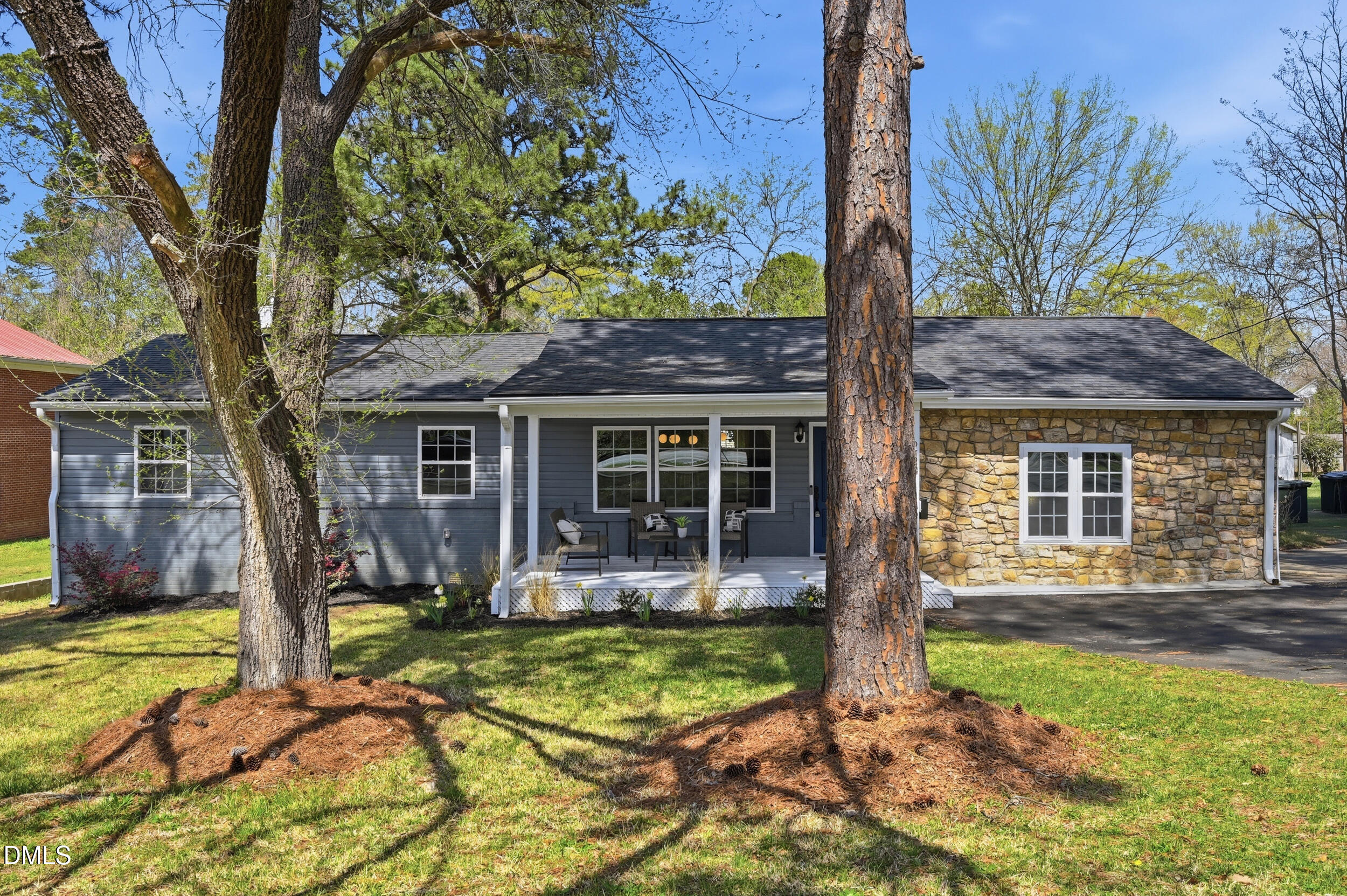 2301 Milburnie Road Raleigh, NC 27610 - Photo 1 of 23 front view of a house with a yard