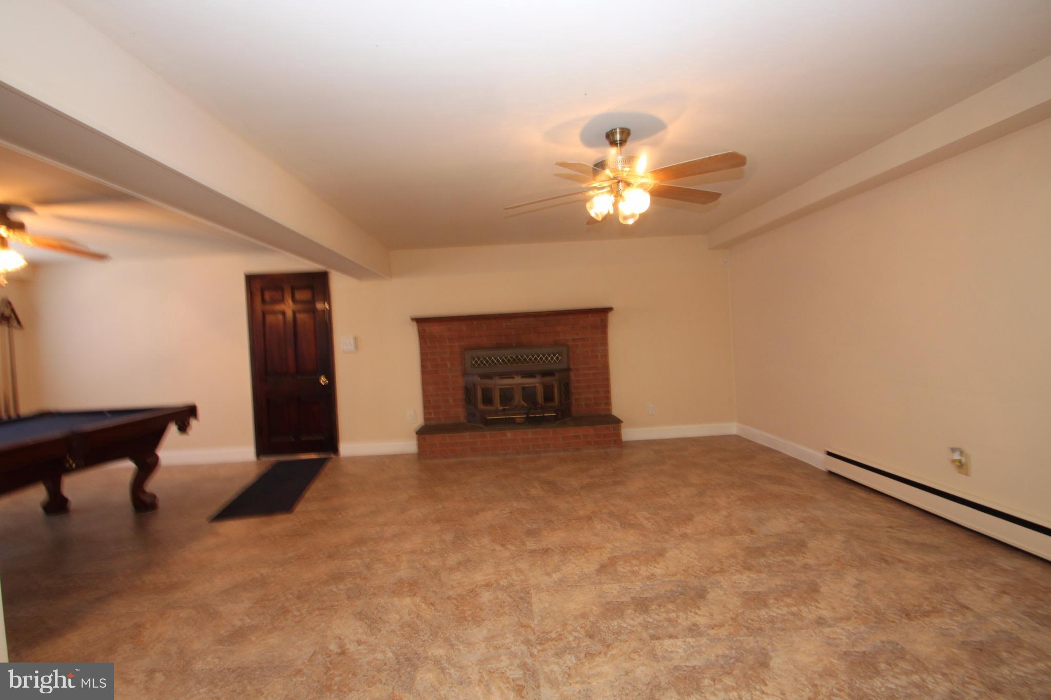 8348 Rixeyville Road Rixeyville, VA 22737 - Photo 20 of 28 Basement w/ fireplace