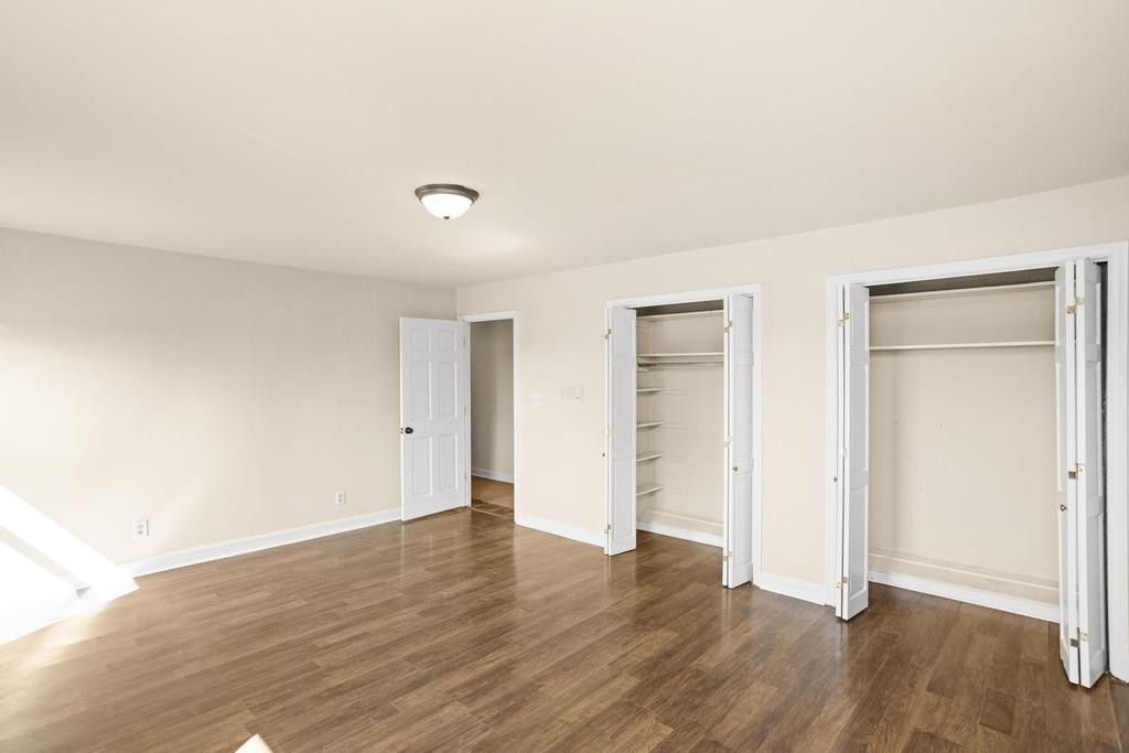 1029 Robertson Road Gallatin, TN 37066 - Photo 27 of 62 a view of an empty room with wooden floor