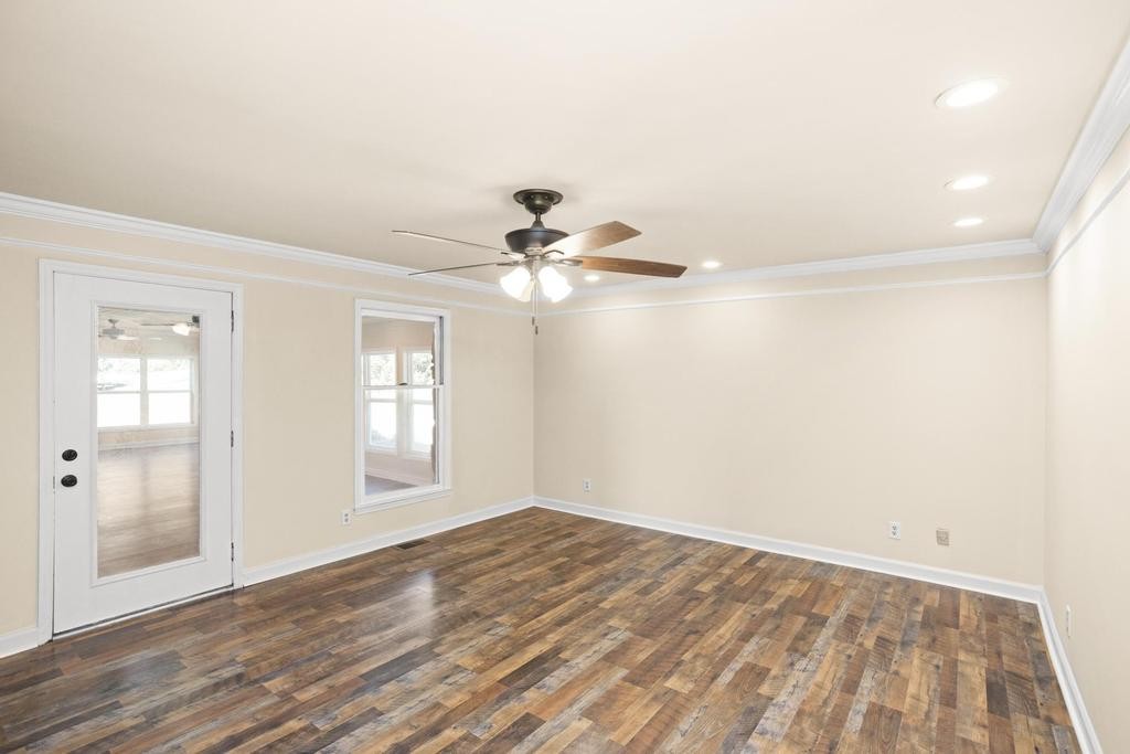 1029 Robertson Road Gallatin, TN 37066 - Photo 31 of 62 a view of empty room with wooden floor and fan