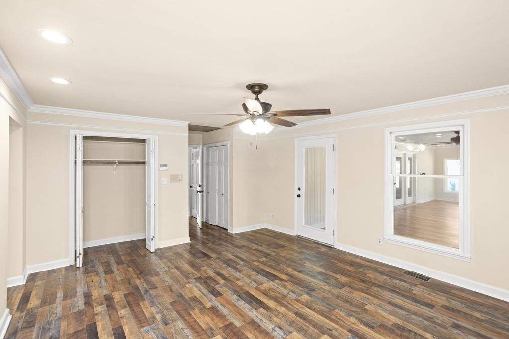 1029 Robertson Road Gallatin, TN 37066 - Photo 32 of 62 a view of empty room with wooden floor and fan