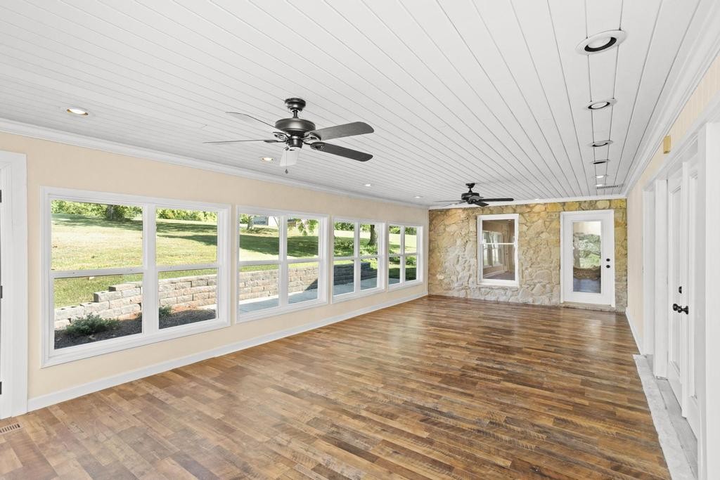 1029 Robertson Road Gallatin, TN 37066 - Photo 39 of 62 a view of an empty room with a window and wooden floor