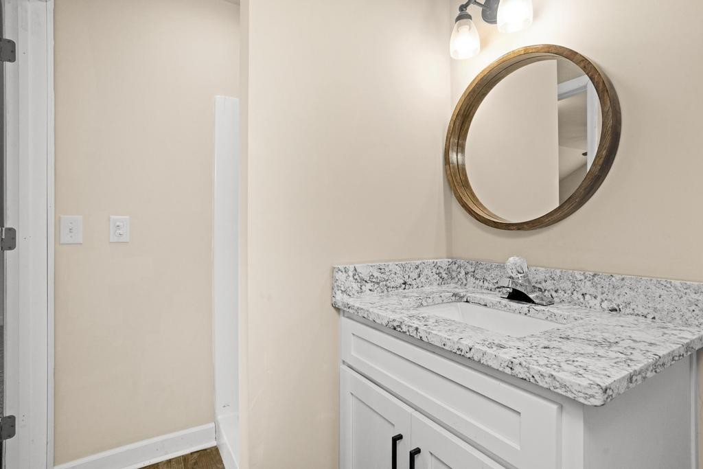 1029 Robertson Road Gallatin, TN 37066 - Photo 43 of 62 a bathroom with a sink and a mirror