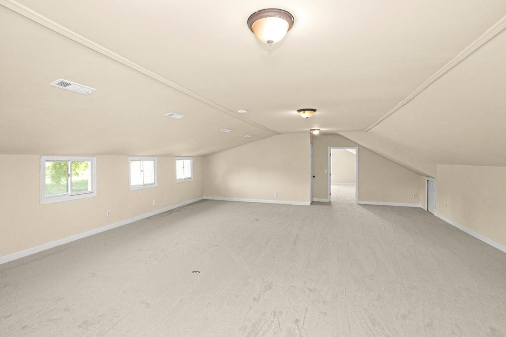 1029 Robertson Road Gallatin, TN 37066 - Photo 46 of 62 an empty room with windows and ceiling fan