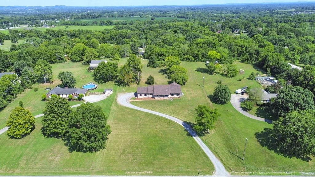 1029 Robertson Road Gallatin, TN 37066 - Photo 55 of 62 an aerial view of a residential houses with outdoor space and trees