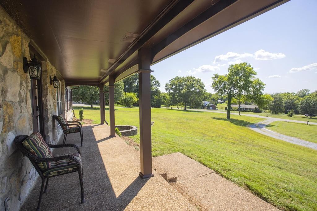 1029 Robertson Road Gallatin, TN 37066 - Photo 6 of 62 a view of a swimming pool with an outdoor seating