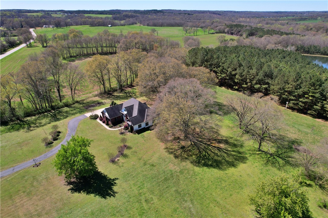 7893 Athens Road Carnesville, GA 30521 - Photo 46 of 50 Perched on a sprawling landscape, this property offers serene, expansive views.