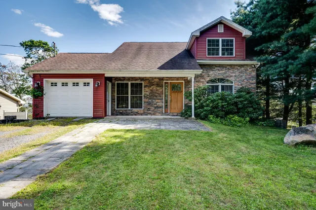a view of a house with garden