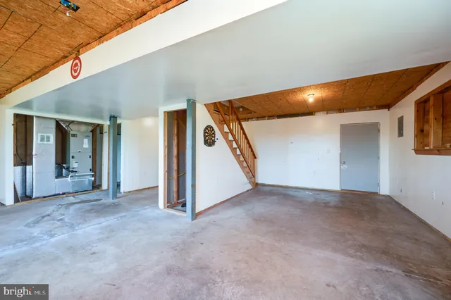 a view of a balcony with wooden fence