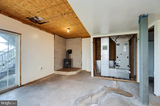 a view of a balcony with wooden floor