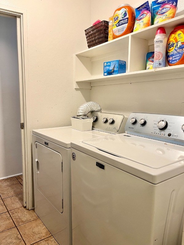 4701 Kawaihau Road, Unit L101 Kapaa, HI 96746 - Photo 11 of 12 a utility room with dryer and washer