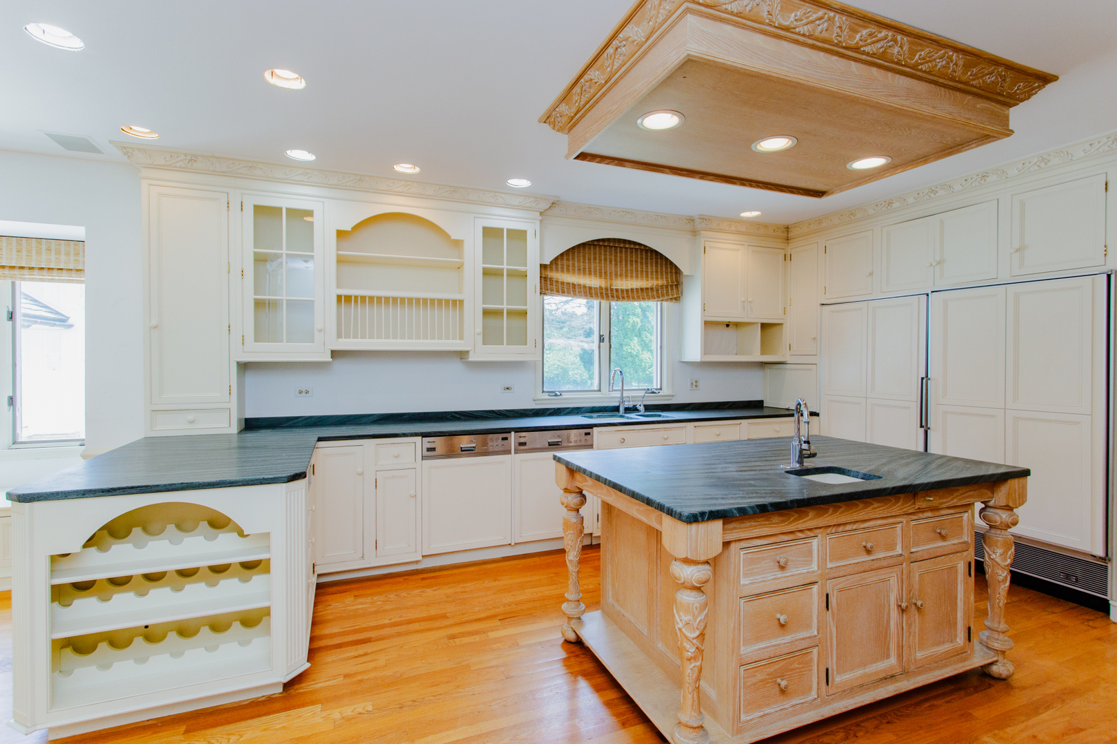 52 Aintree Road St. Charles, IL 60174 - Photo 6 of 15 a kitchen with stainless steel appliances granite countertop a sink a stove and a window