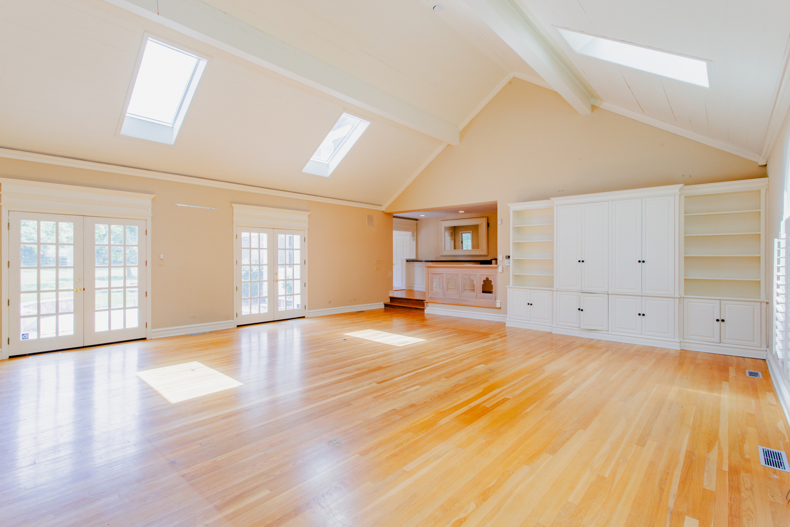 52 Aintree Road St. Charles, IL 60174 - Photo 9 of 15 a view of empty room with wooden floor and fan