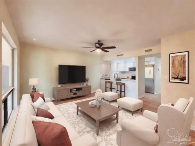 a kitchen with a sink cabinets and stainless steel appliances