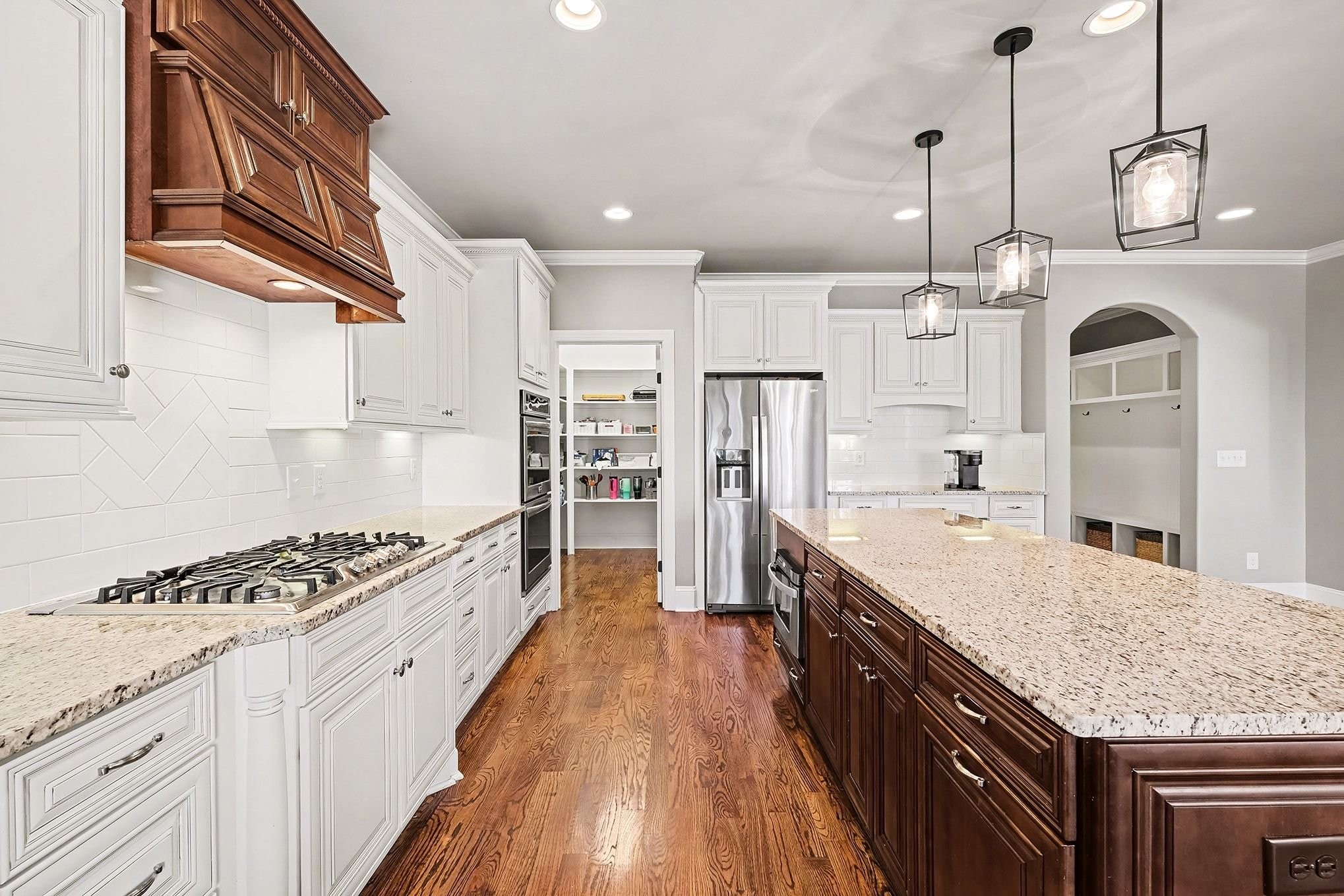 2015 Autumn Ridge Way Spring Hill, TN 37174 - Photo 11 of 42 a large kitchen with stainless steel appliances granite countertop a lot of counter space and wooden floors