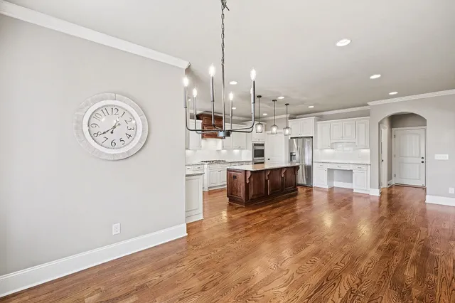 a bathroom with a sink a toilet and a tub