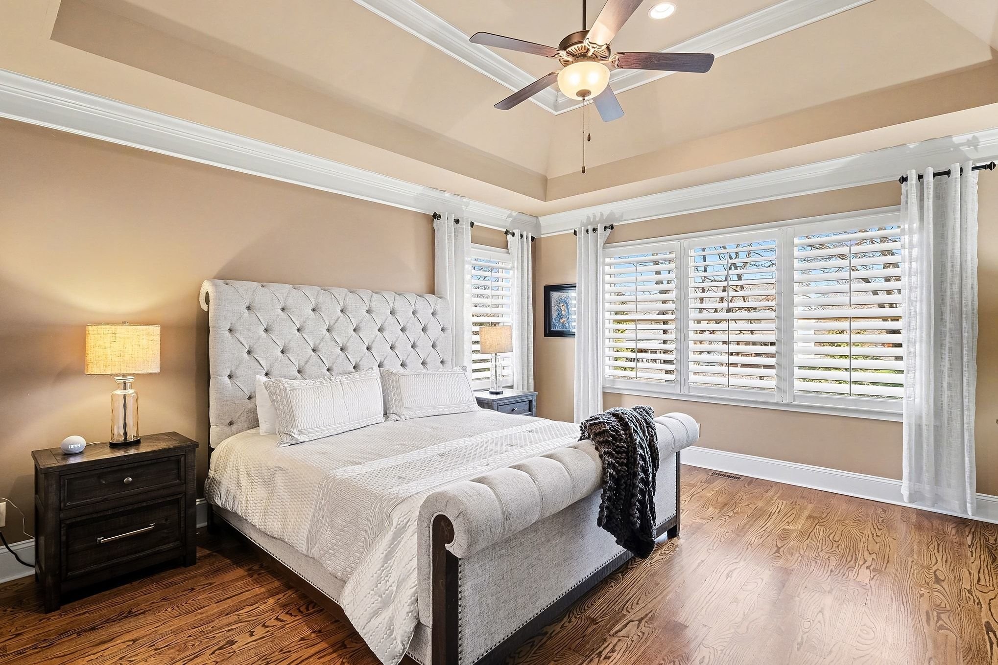 2015 Autumn Ridge Way Spring Hill, TN 37174 - Photo 16 of 42 a spacious bedroom with a large bed and a chandelier