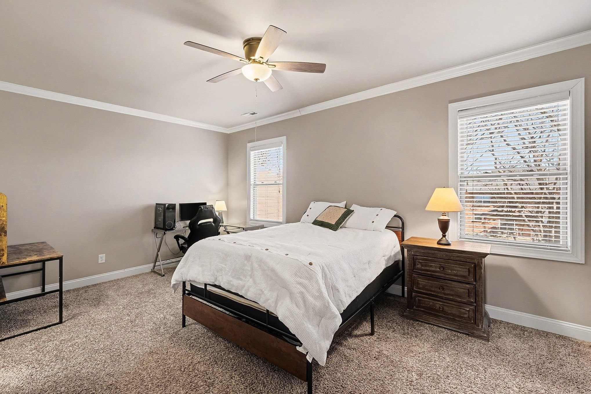 2015 Autumn Ridge Way Spring Hill, TN 37174 - Photo 30 of 42 a bedroom with a bed a chandelier and a window