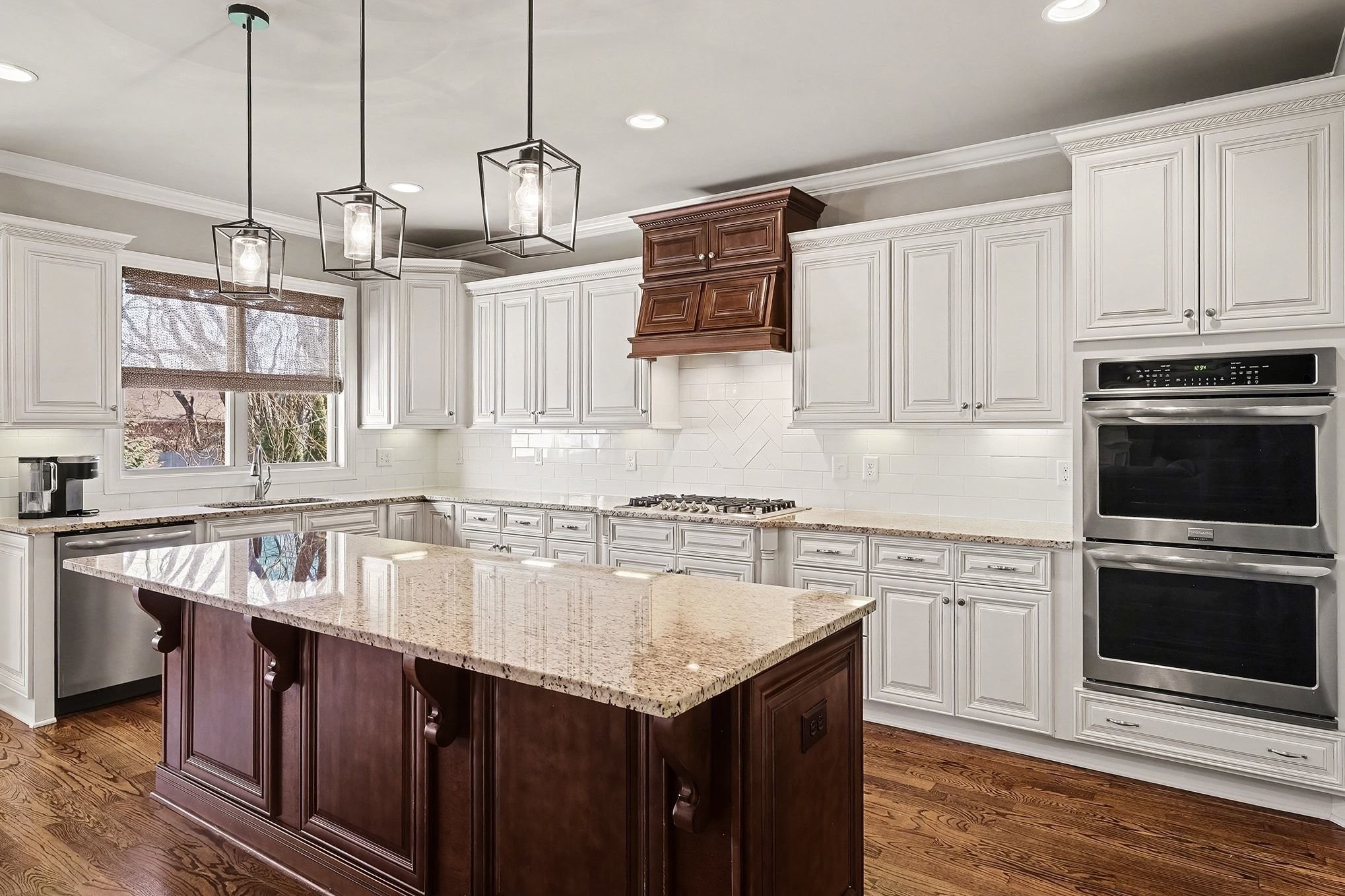2015 Autumn Ridge Way Spring Hill, TN 37174 - Photo 9 of 42 a kitchen with stainless steel appliances granite countertop a sink a stove and a wooden floor