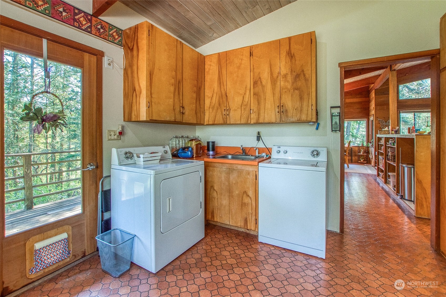 153 Exton Road Orcas Island, WA 98280 - Photo 14 of 30 a kitchen with a refrigerator and a stove
