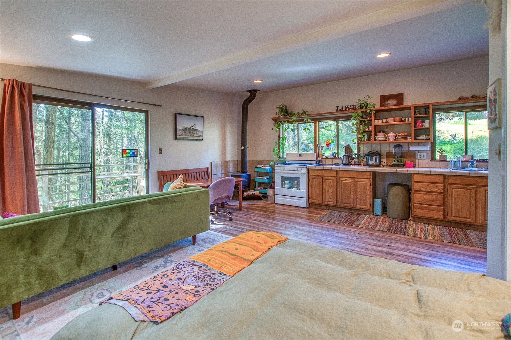 153 Exton Road Orcas Island, WA 98280 - Photo 26 of 30 a living room with furniture and a large window