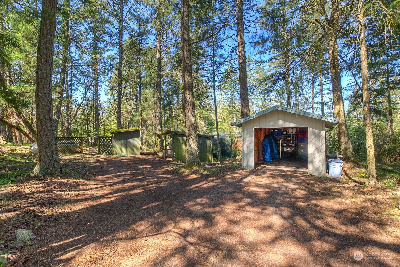 153 Exton Road Orcas Island, WA 98280 - Photo 29 of 30 a view of house with outdoor space and trees