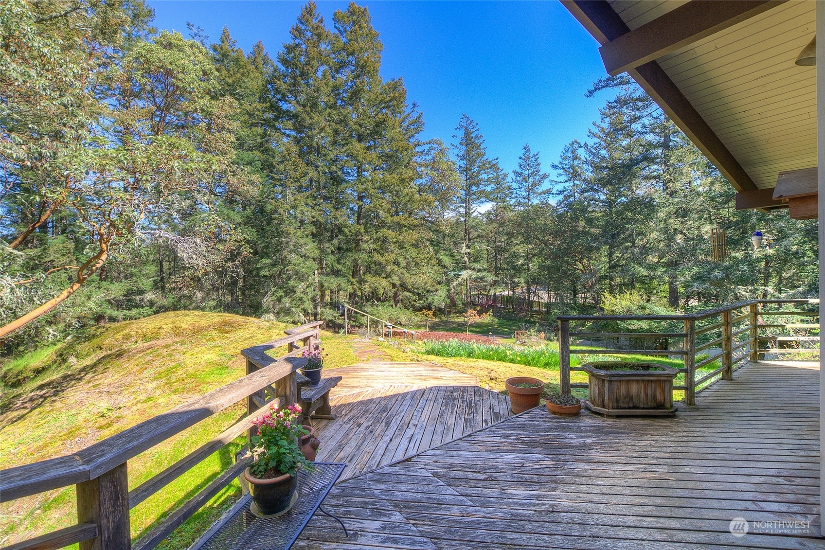 153 Exton Road Orcas Island, WA 98280 - Photo 4 of 30 a view of a swimming pool with a patio and a yard