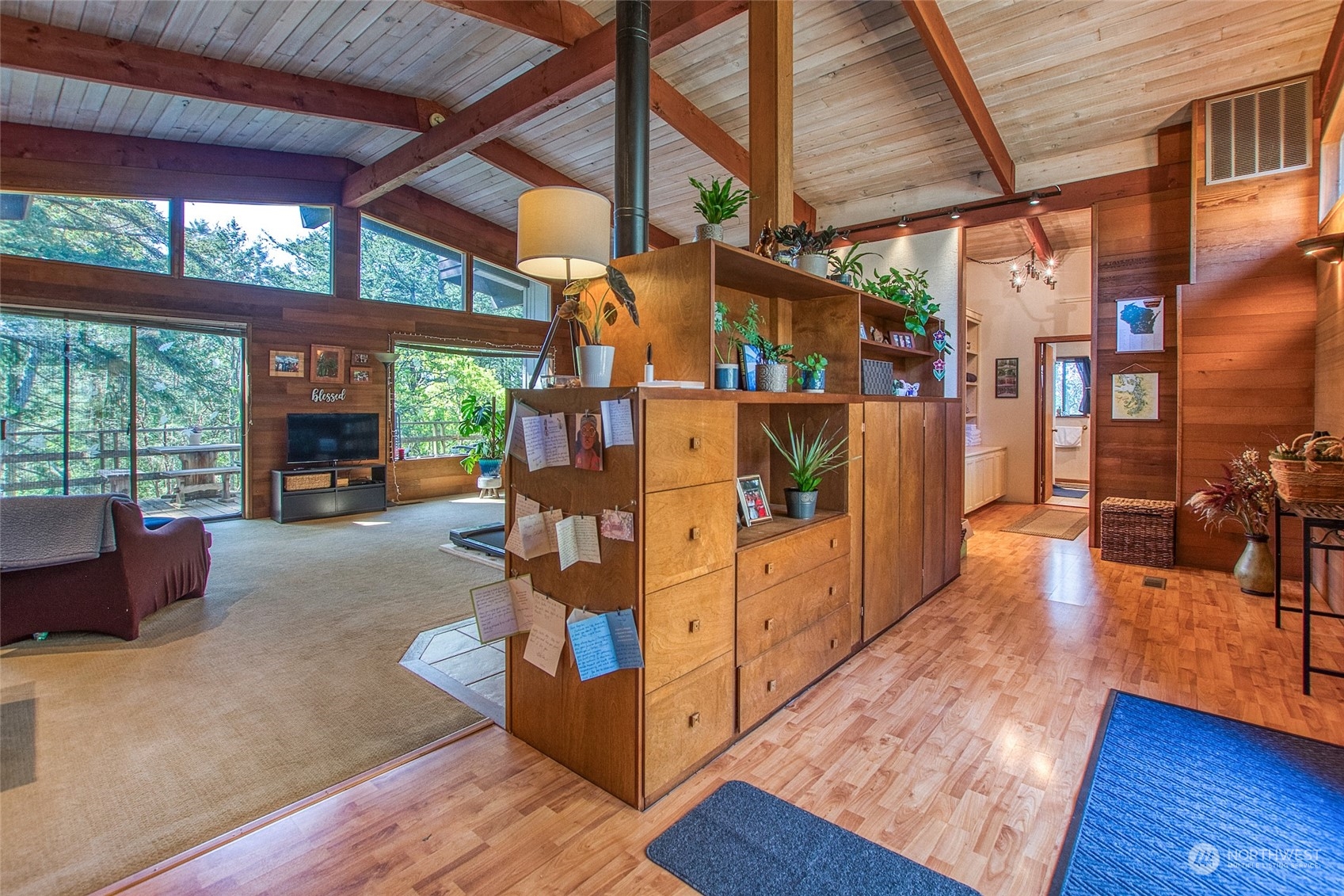 153 Exton Road Orcas Island, WA 98280 - Photo 7 of 30 a view of a living room with furniture and a fireplace