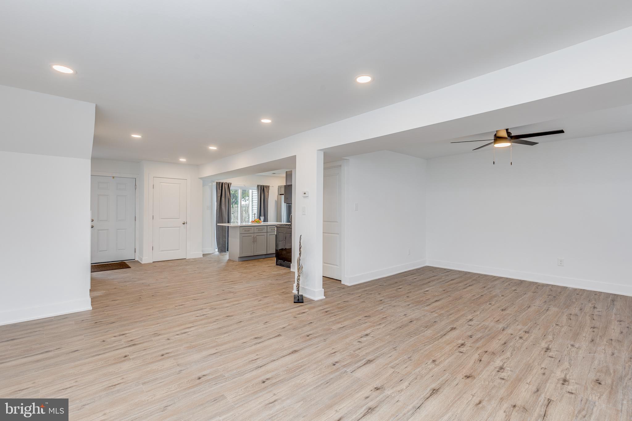 705 Mason Run Pine Hill, NJ 08021 - Photo 14 of 33 a view of empty room with wooden floor