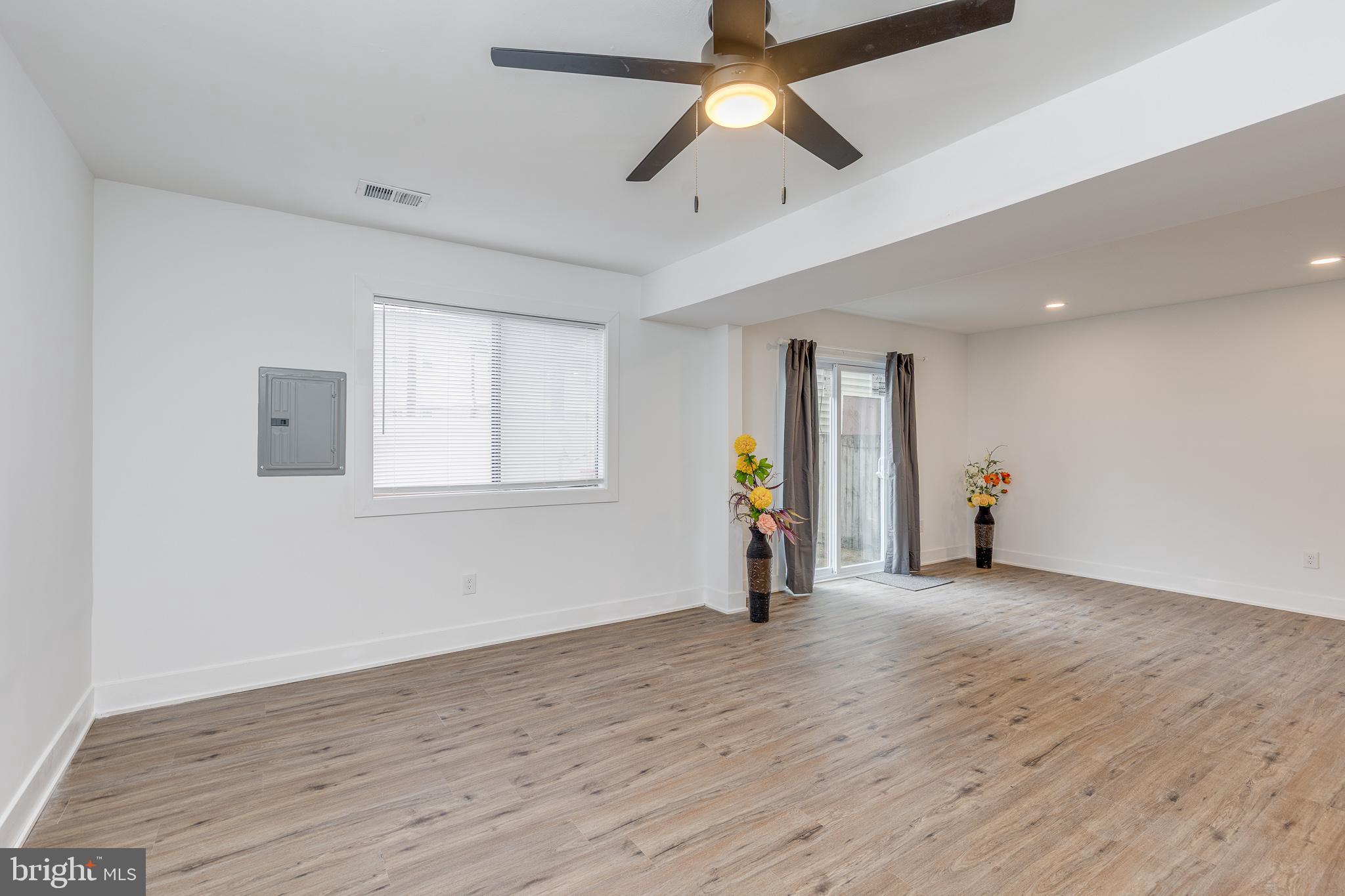 705 Mason Run Pine Hill, NJ 08021 - Photo 16 of 33 wooden floor in an empty room with a window