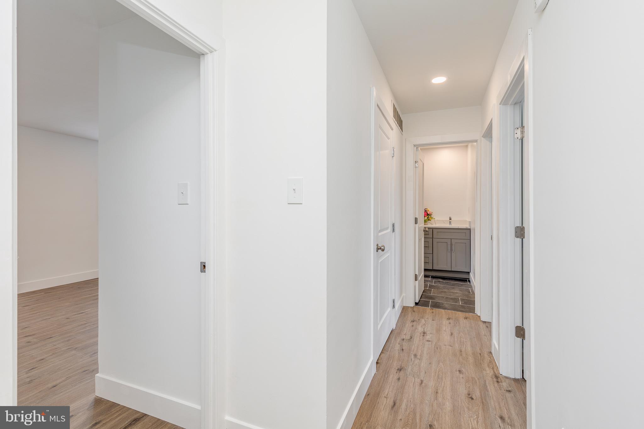 705 Mason Run Pine Hill, NJ 08021 - Photo 18 of 33 a view of a bathroom from a hallway