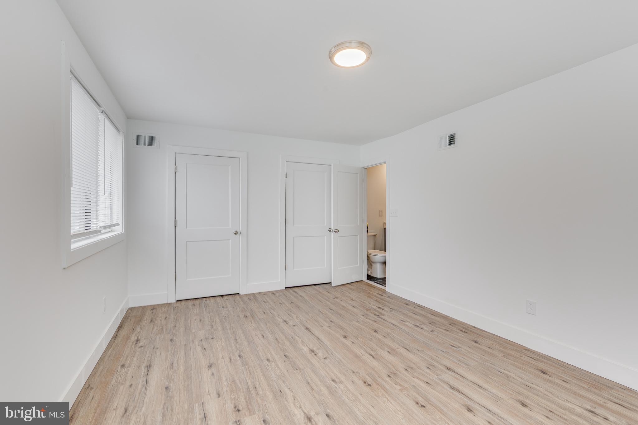 705 Mason Run Pine Hill, NJ 08021 - Photo 20 of 33 a view of empty room with wooden floor and fan