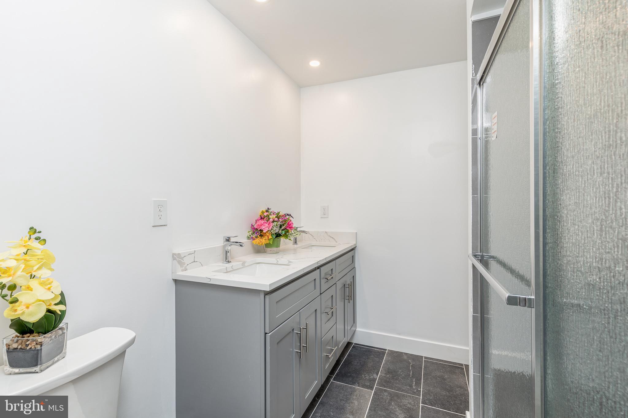 705 Mason Run Pine Hill, NJ 08021 - Photo 22 of 33 a bathroom with a sink and a mirror