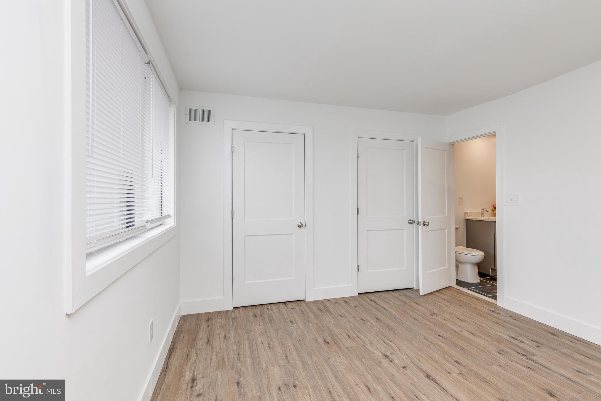 705 Mason Run Pine Hill, NJ 08021 - Photo 23 of 33 a view of empty room with wooden floor and fan