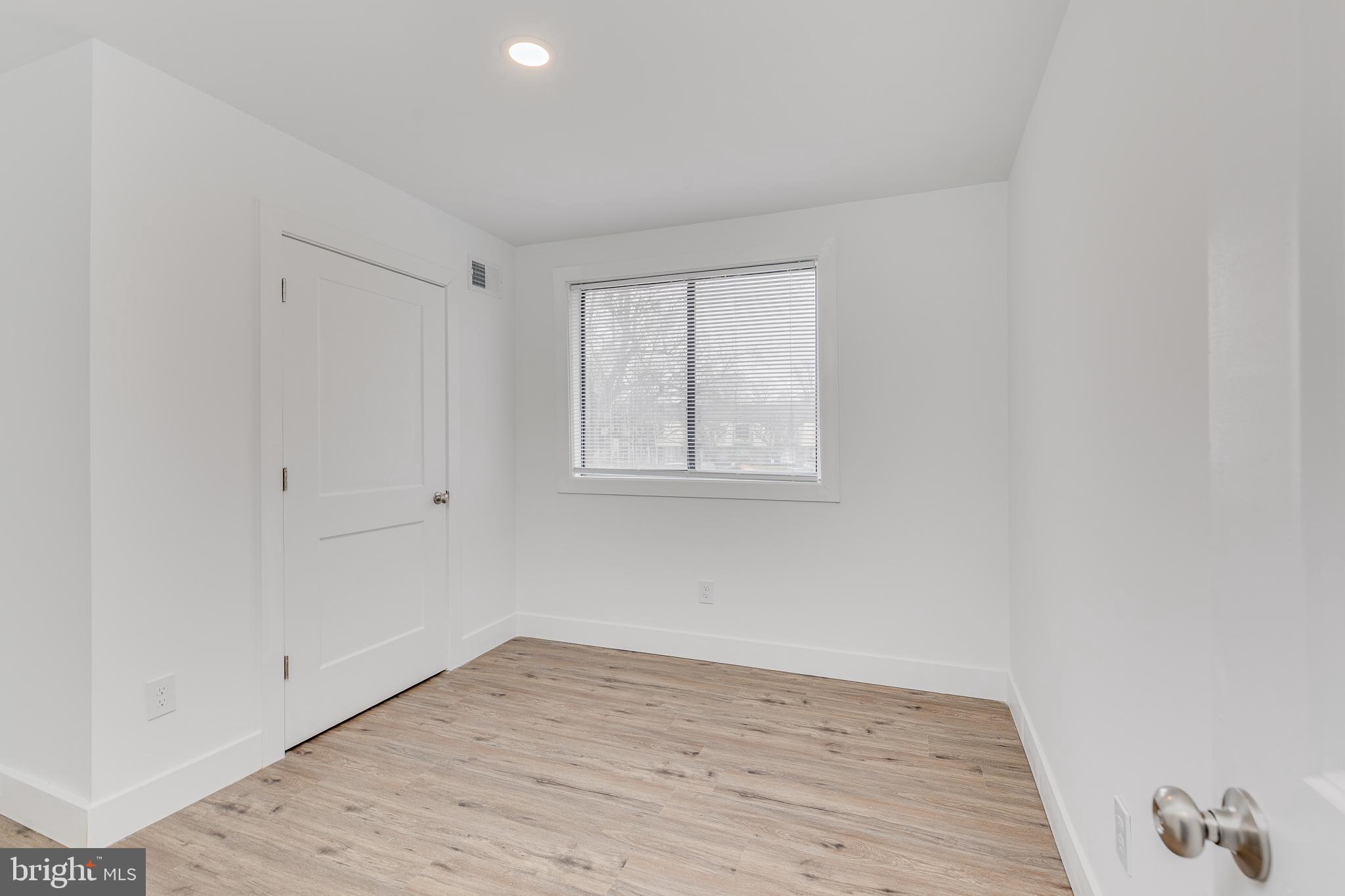705 Mason Run Pine Hill, NJ 08021 - Photo 26 of 33 a view of empty room with wooden floor