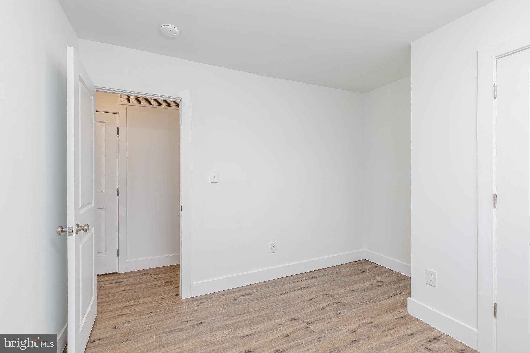 705 Mason Run Pine Hill, NJ 08021 - Photo 27 of 33 a view of an empty room with wooden floor and closet
