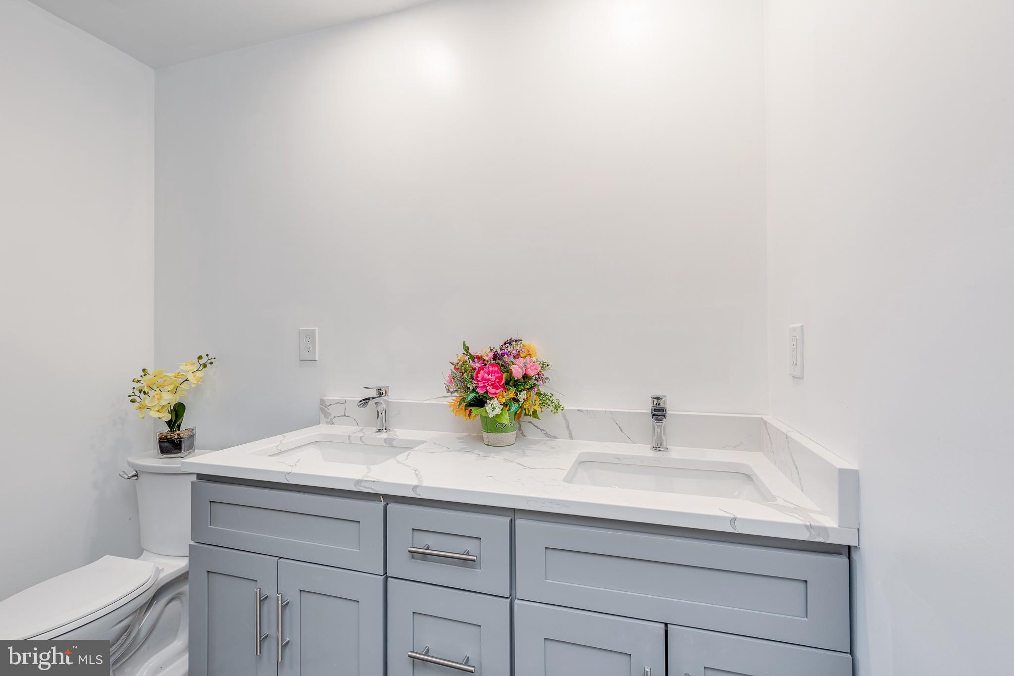 705 Mason Run Pine Hill, NJ 08021 - Photo 28 of 33 a bathroom with a sink and a mirror
