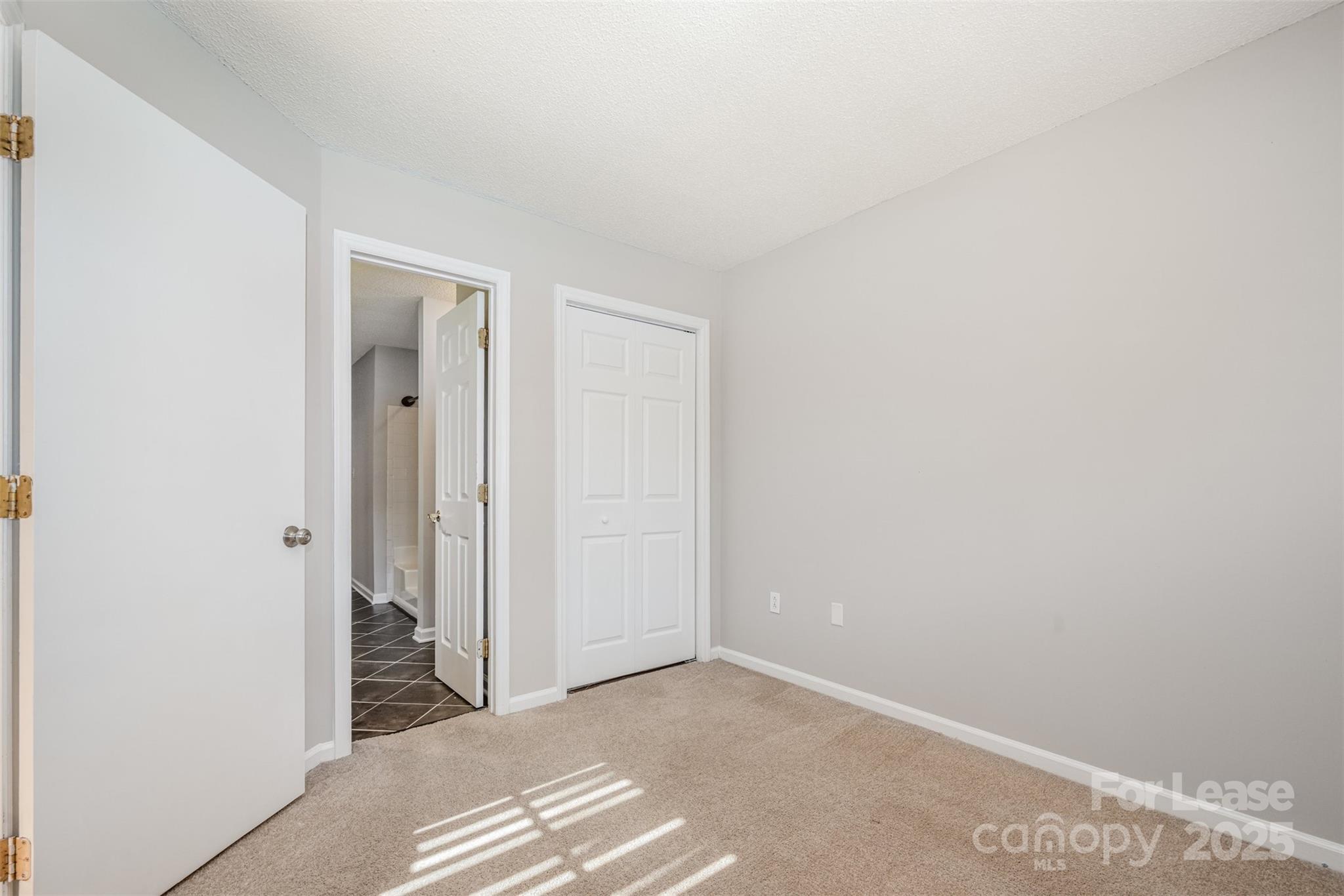 2555 Stockbridge Drive, Unit C Charlotte, NC 28210 - Photo 14 of 19 a view of an empty room