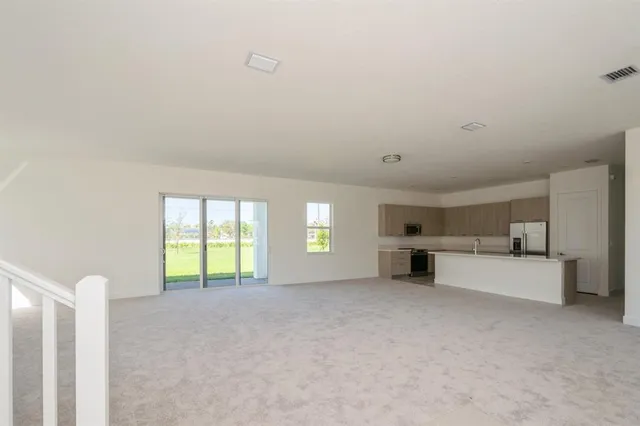 a view of a livingroom with an entryway