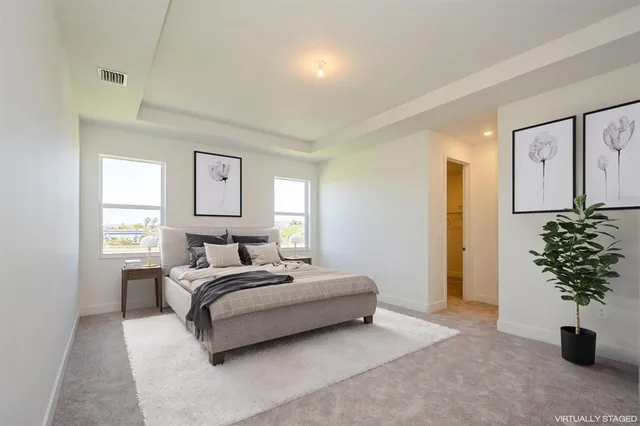 an empty room with closet area