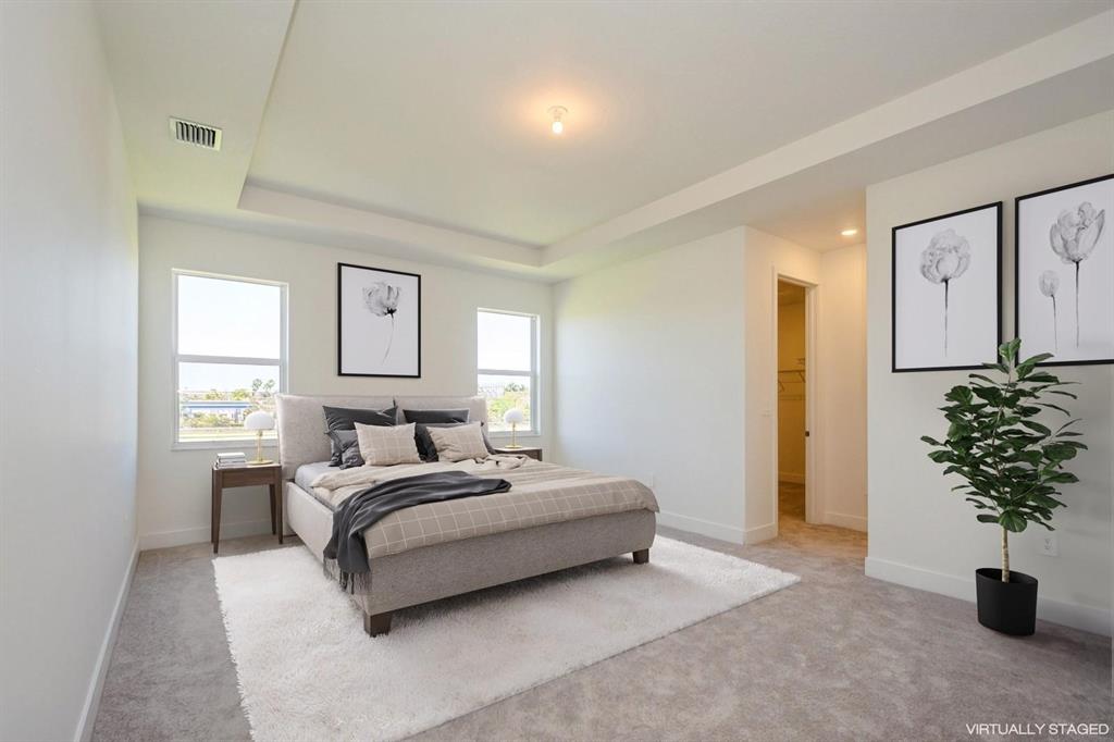 4385 Southwest 123rd Avenue Davie, FL 33330 - Photo 17 of 46 a bedroom with a bed and a potted plant