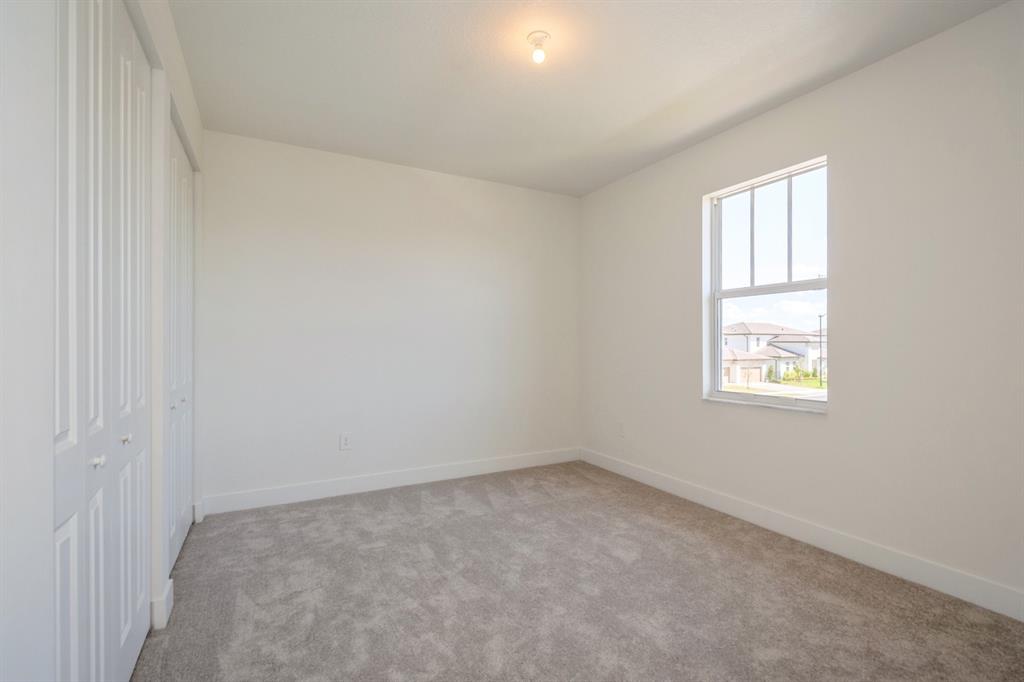 4385 Southwest 123rd Avenue Davie, FL 33330 - Photo 22 of 46 an empty room with a window