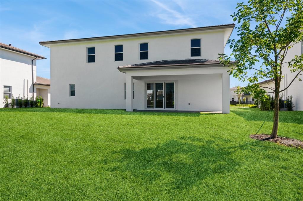 4385 Southwest 123rd Avenue Davie, FL 33330 - Photo 30 of 46 a view of a house with backyard and garden